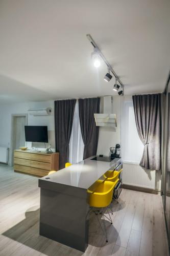 En tv och/eller ett underhållningssystem på Relaxing Flat Floresti