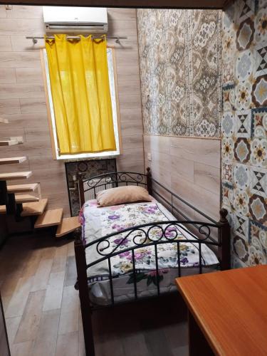 Llit o llits en una habitació de Hostel Voyage