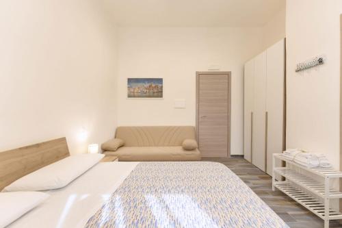 Ein Bett oder Betten in einem Zimmer der Unterkunft Lo Scuncino