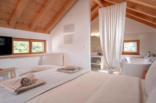 Ένα ή περισσότερα κρεβάτια σε δωμάτιο στο Dolce Terra
