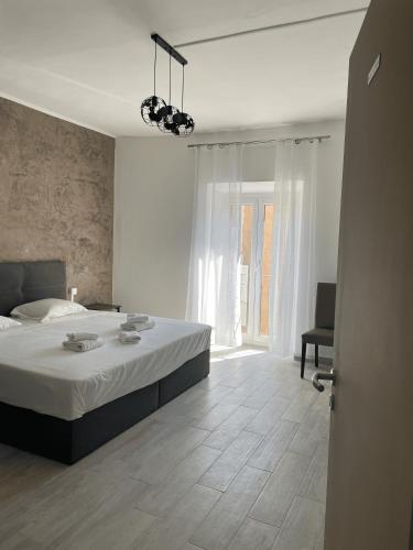 Postel nebo postele na pokoji v ubytování L'Escale chambres privées chez l'habitant JFDL