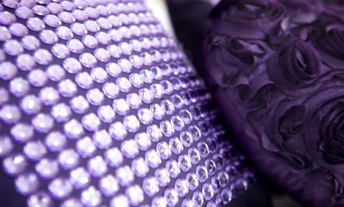 a close up of a purple tie with lights on it at Garden Spa Boutique Hotel in Skopje