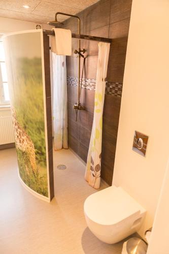 Ванная комната в Boutique Hotel Postgården