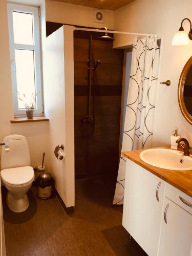 Ванная комната в Boutique Hotel Postgården