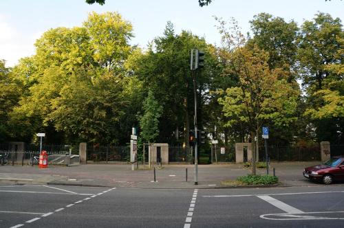 an empty street with a traffic light at an intersection at Köln Deutz/Messe, Lanxess Arena in Cologne