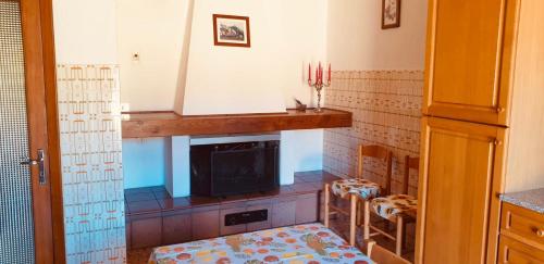 Un pat sau paturi într-o cameră la Da Nonna Gio'