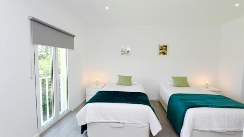 Postel nebo postele na pokoji v ubytování Marina Algarve-CleverDetails, located on the marina close to all main amenities