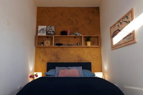 A bed or beds in a room at Apartmán - modern home