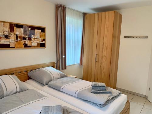 Ένα ή περισσότερα κρεβάτια σε δωμάτιο στο Ferienwohnung Jung