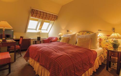 Кровать или кровати в номере Le Palais Art Hotel Prague