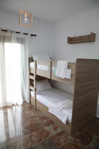 Postel nebo postele na pokoji v ubytování Lemon tree house