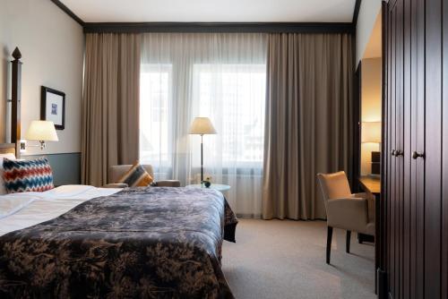 Postel nebo postele na pokoji v ubytování Elite Palace Hotel & Spa