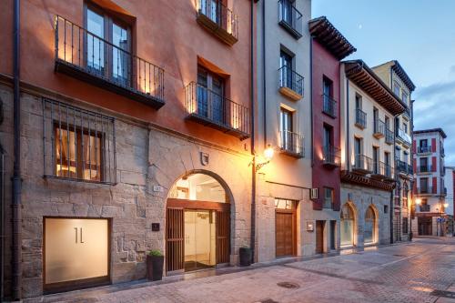 an alley in a city with buildings at Sercotel Calle Mayor in Logroño