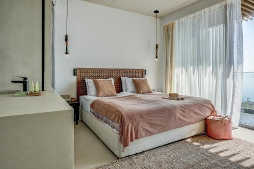Ένα ή περισσότερα κρεβάτια σε δωμάτιο στο Umani Hotel - Free Beach - Free Parking