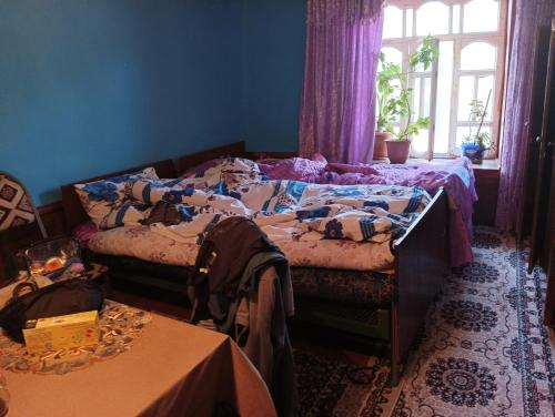 Kama o mga kama sa kuwarto sa Ecomama in Xınalıq Khinalig guest house