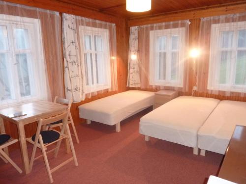 Postel nebo postele na pokoji v ubytování Chata U Vleku
