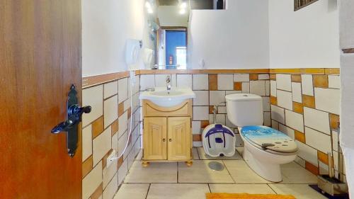 Ванная комната в Holidays Tenerife breakfast inclusive wifi pool fr