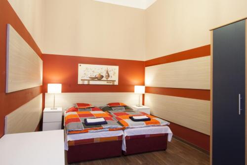 Posteľ alebo postele v izbe v ubytovaní City Centre Cosy Apartments