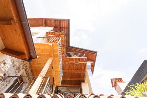 an external view of a building with wooden stairs at Appartamento Topo in Trarego