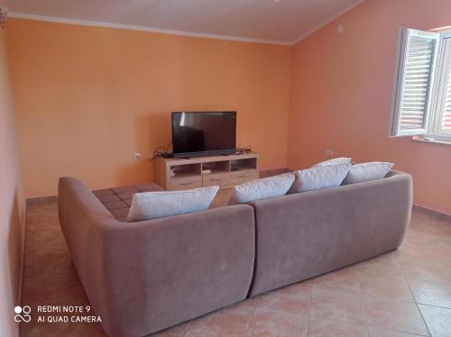 Et tv og/eller underholdning på Family Apartment Nelly