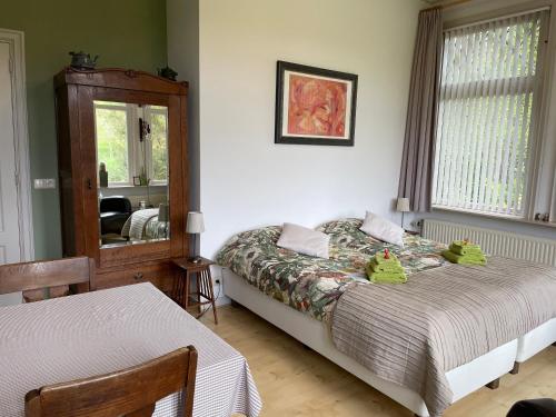 Katil atau katil-katil dalam bilik di B&B De Zulthe