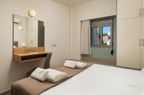 Katil atau katil-katil dalam bilik di Dimitra Central Apts