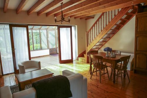 a living room with a table and a couch at Killeena House in Baltimore