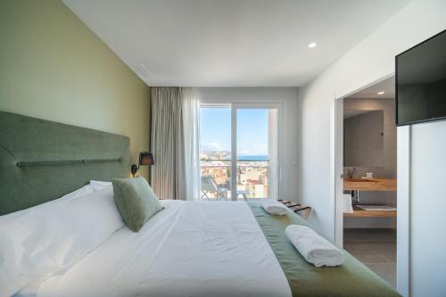 Postel nebo postele na pokoji v ubytování Ahoy Apartments