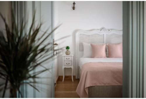 Ένα ή περισσότερα κρεβάτια σε δωμάτιο στο Barıs Otel Cunda