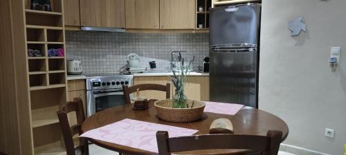 Kuchyň nebo kuchyňský kout v ubytování Anemomilos Villa