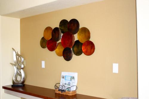 a group of plates on a wall at Days Inn by Wyndham Globe in Globe