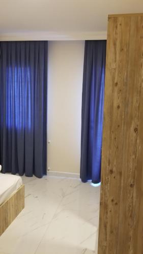 Ένα ή περισσότερα κρεβάτια σε δωμάτιο στο Huge Evleri 1