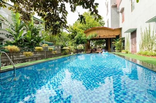 Kolam renang di atau dekat dengan tam cốc relax homestay