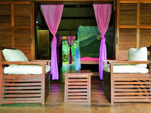 Ruang duduk di Chambres d'hôtes Villa Les Orchidées Chez Ago