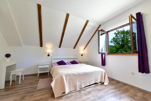 Posteľ alebo postele v izbe v ubytovaní Apartman Doris