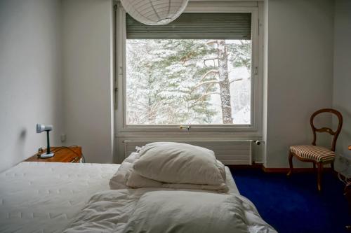 Een bed of bedden in een kamer bij Grosse 4 Zimmer Wohnung mit traumhafter Aussicht