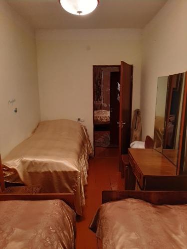 Cama o camas de una habitación en BARDZRAVAN HYURATUN