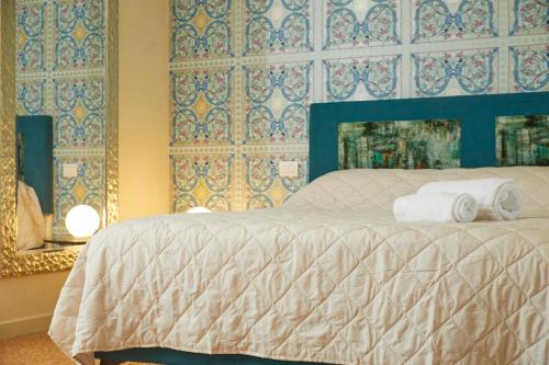 Letto o letti in una camera di Ca' Masieri Hotel