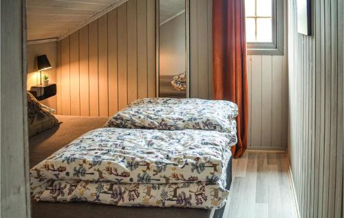 Postel nebo postele na pokoji v ubytování Cozy Apartment In Gol With Kitchen