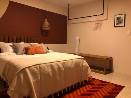 a bedroom with a bed and a basketball hoop at Casa Crónica in Oaxaca City
