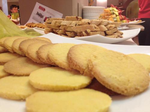 a pile of bread and crackers on a table at Hotel Porto Azzurro in Sirmione