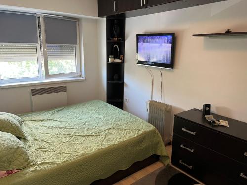 Кровать или кровати в номере Apartament Milan