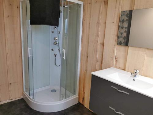 a bathroom with a shower and a sink at Les Grands Riez - logement à la campagne 