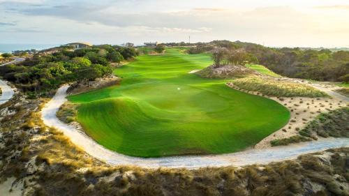 an overhead view of a golf course at Holiday Inn Resort Ho Tram Beach by IHG in Ho Tram