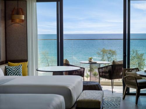 a hotel room with a view of the ocean at Crowne Plaza Phu Quoc Starbay by IHG in Phu Quoc