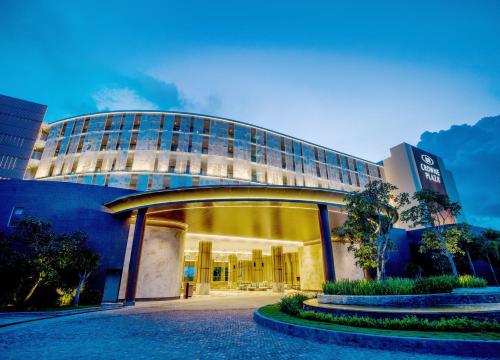 a large building with a glass entry way at Crowne Plaza Phu Quoc Starbay by IHG in Phu Quoc