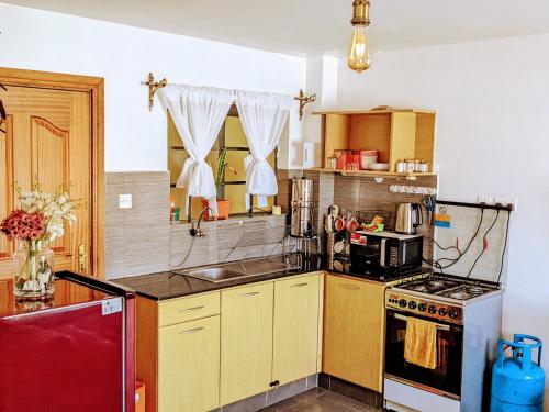 Η κουζίνα ή μικρή κουζίνα στο The Little Sanctuary -Apartment 407