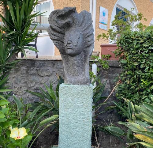 a statue of a bust of a woman at Hotel Parco Delle Agavi in Ischia