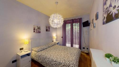 Postel nebo postele na pokoji v ubytování Appartamento al Moro