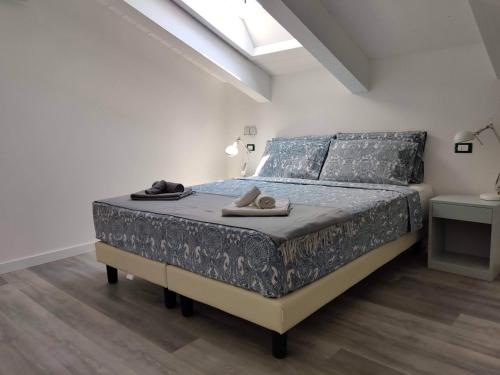 Giường trong phòng chung tại Sotto il Cielo